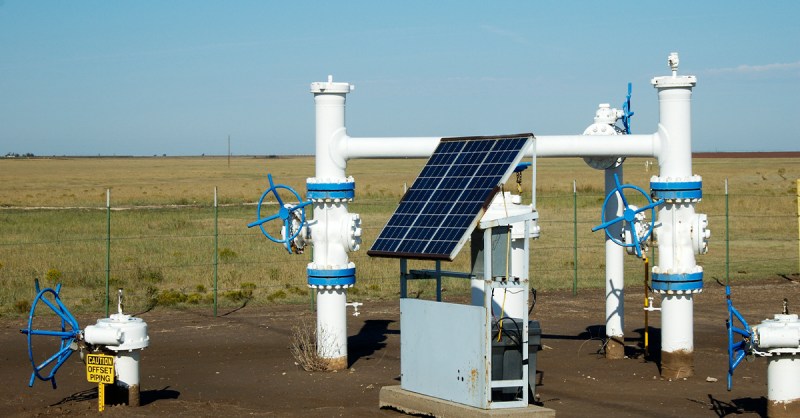Remote oil and gas pipeline valve station with solar panel, illustrating industrial IoT connectivity challenges for 5G RedCap